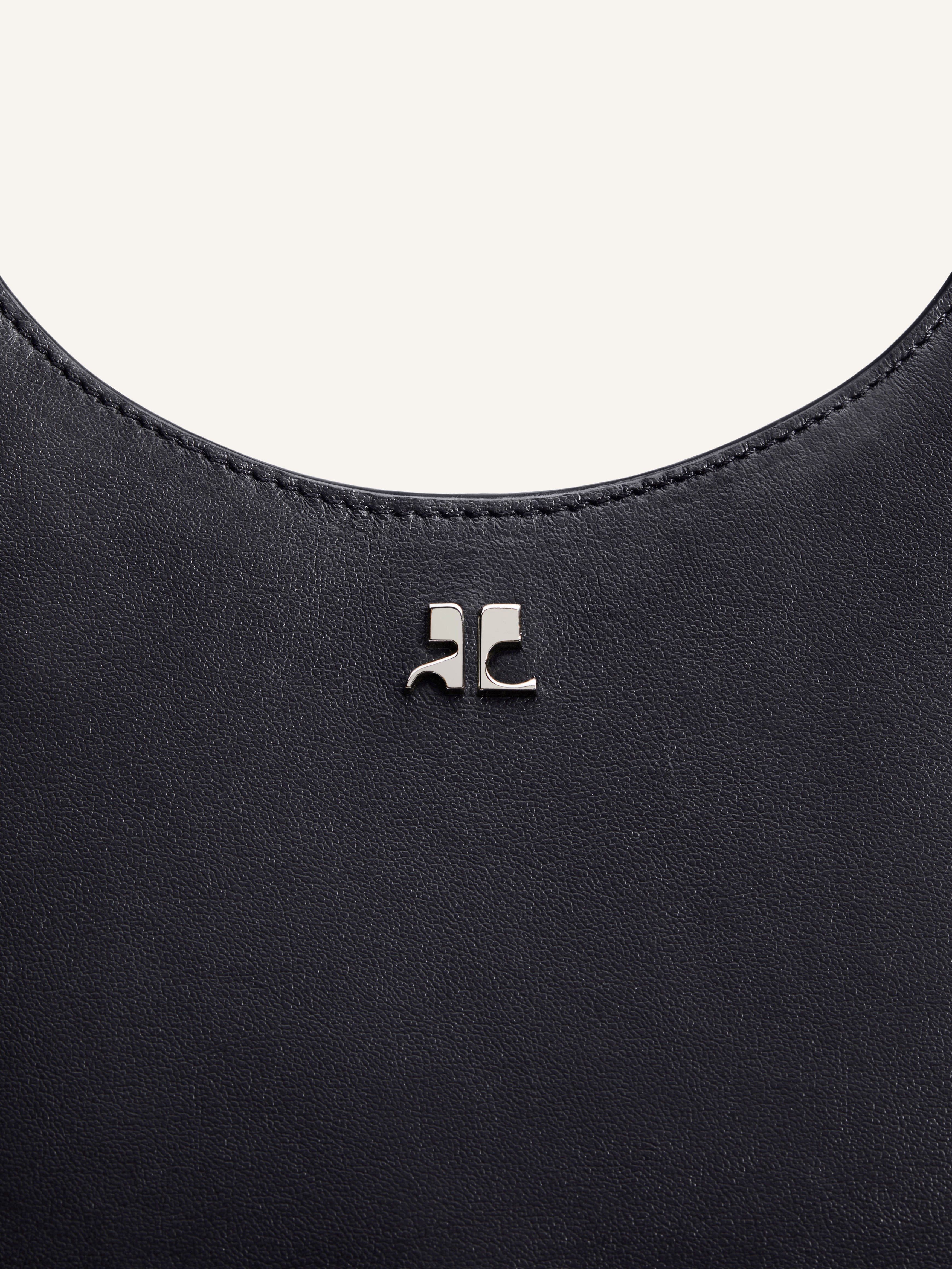一番の HOLY LEATHER BAG - courrèges (クレージュ) トップス